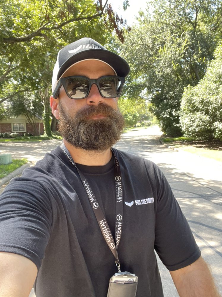 Slide of Phil The Roofer