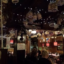 Mermaid Seafood Restaurant - Lots of bottles on the ceiling...