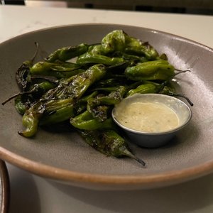 Photo of Tavola Italian Kitchen + Bar - Minneapolis, MN, United States. The Grilled Shishito Peppers, that dipping sauce was excellent