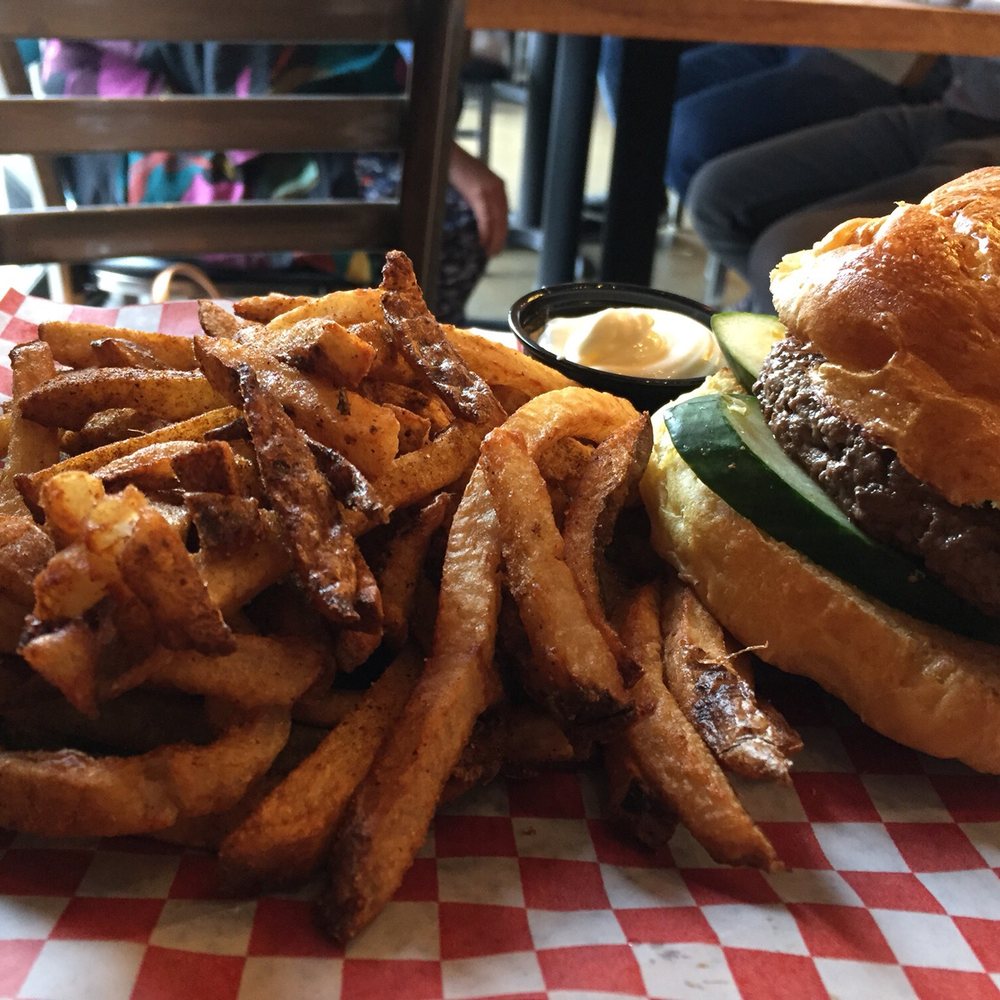 D.A.D.'s burger with a side of jerk fries D.A.D.'s burger with a side of jerk fries