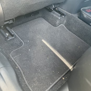 Ready Set Auto Spa - Before - backseat floor - Auto Detailing Near Me