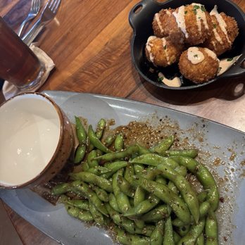 Lazy Dog Restaurant & Bar - Edamame and Loaded Potato Hushpuppies - New American Near Me - Arlington, Texas Lazy Dog Restaurant & Bar - Edamame and Loaded Potato Hushpuppies - New American Near Me - Arlington, Texas