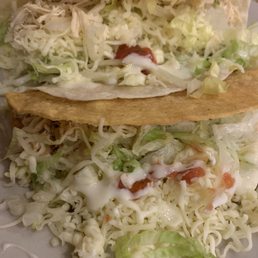 Just two chicken tacos. One soft one hard. Inexpensive and tasty Just two chicken tacos. One soft one hard. Inexpensive and tasty