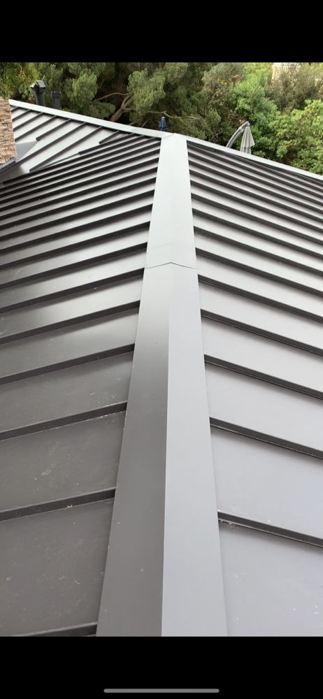 Slide of A&M Roofing and Gutters