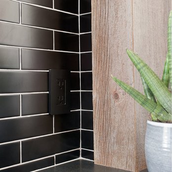 Bradys Fix-it Services - Very clean black on black outlet changed out on black tile. - Electricians Near Me Bradys Fix-it Services - Very clean black on black outlet changed out on black tile. - Electricians Near Me