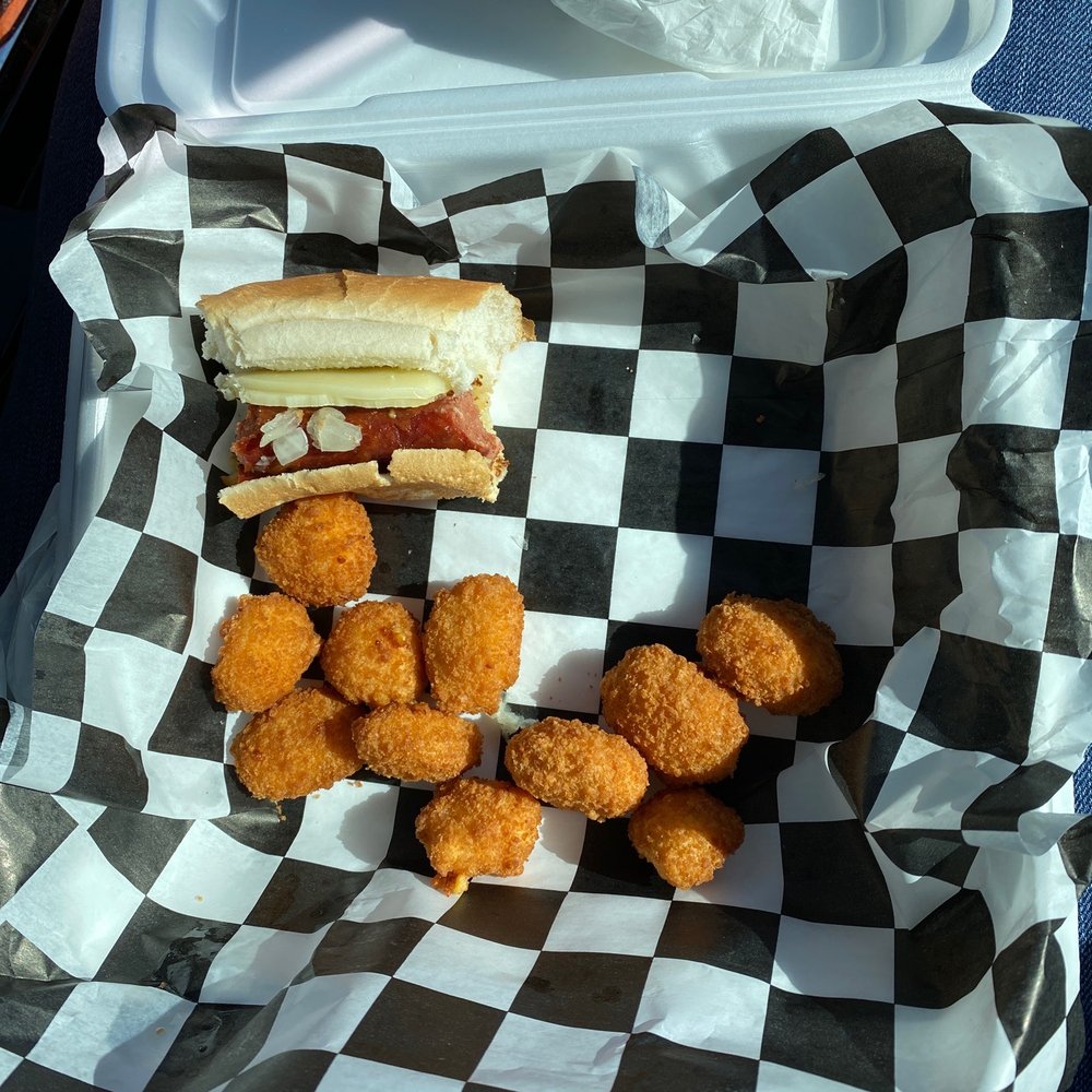 Hotdog w/ onions Boetje's mustard and provolone and a side of cheese curds. Hotdog w/ onions Boetje's mustard and provolone and a side of cheese curds.