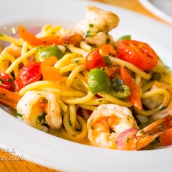 Justa Pasta - Bucatini with wild gulf prawns castelvetrano olives, capers, red onions, red bell peppers, cherry tomatoes, parsley, garlic, white wine &btr