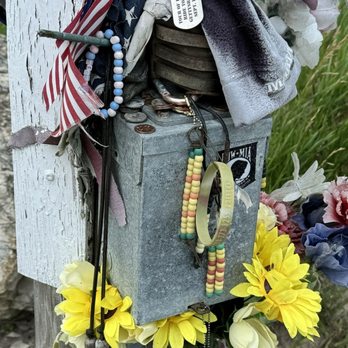 Freedom Rock - A light pole at the Freedom Rock.  A lot of people leave mementos here. - Art Galleries Near Me