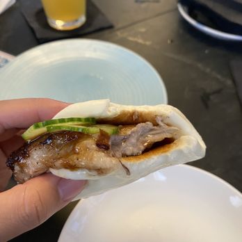 Bar Peached - PORKBUNS $11 vietnamese braised tenderbelly pork belly, cucumbers, green onions, chinese bbq sauce - Cocktail Bars Near Me - Austin, Texas
