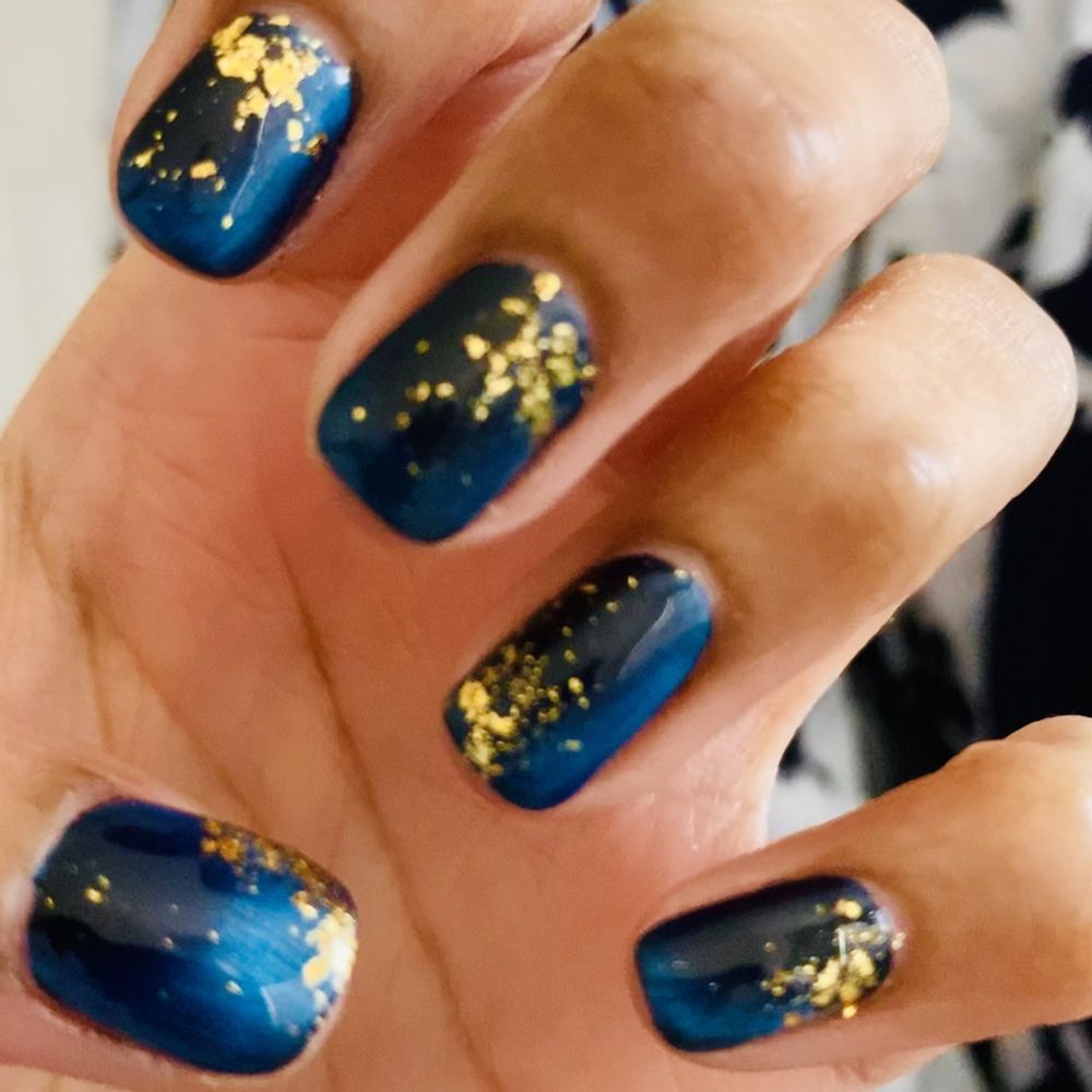 Rosy Nails - Blue gel cateye (black basecoat) and gold flecks, by Melissa - Nail Salons Near Me - Winter Park, Florida Rosy Nails - Blue gel cateye (black basecoat) and gold flecks, by Melissa - Nail Salons Near Me - Winter Park, Florida