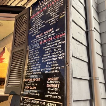 Josie's Ice Cream - a menu on the side of a building - Ice Cream & Frozen Yogurt Near Me - Cumberland, Rhode Island
