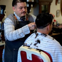 Cedar Park Barbershop - Michael cutting hair
