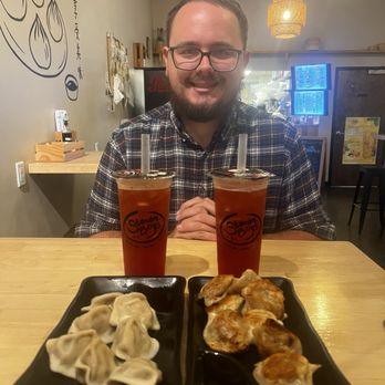 Steamboys - Pork and Shrimp Dumpling steamed and seared. Both drinks are strawberry fruit tea with strawberry popping boba - Chinese Near Me - Hermitage, Tennessee