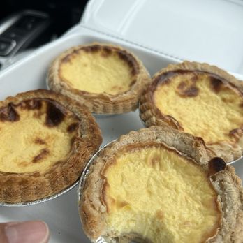Wing Cheng Bakery - Portuguese egg tart. Egg mixture looks a little curdled. - Bakeries Near Me - Falls Church, Virginia Wing Cheng Bakery - Portuguese egg tart. Egg mixture looks a little curdled. - Bakeries Near Me - Falls Church, Virginia