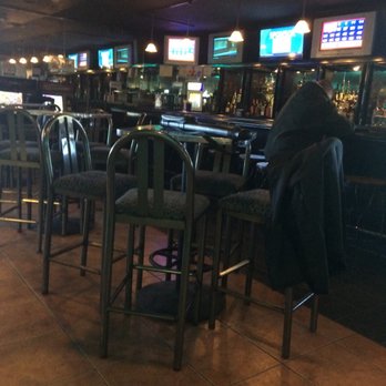 Anazeh Sands East - a man sitting at a bar - Pool Halls Near Me - Grand Rapids, Michigan Anazeh Sands East - a man sitting at a bar - Pool Halls Near Me - Grand Rapids, Michigan