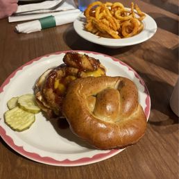 Lone Ranger on a pretzel bun, and curly fries