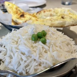 India's Most Wanted - Rice and garlic naan