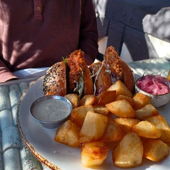 peasants FEAST - Their FAMOUS Hot Chicken Sandwich with roast potatoes - American Near Me - Solvang, California peasants FEAST - Their FAMOUS Hot Chicken Sandwich with roast potatoes - American Near Me - Solvang, California