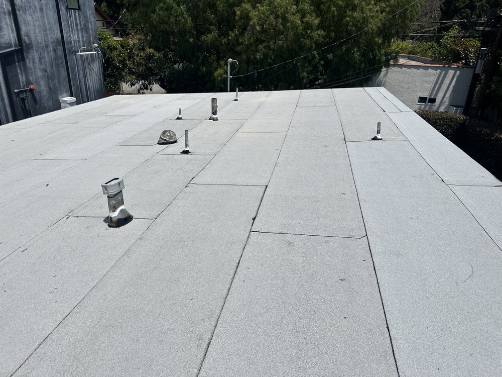 Slide of Twins Roofing