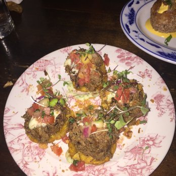 FINKA Table & Tap - Tostones topped with vaca frita - Asian Fusion Near Me - Miami, Florida FINKA Table & Tap - Tostones topped with vaca frita - Asian Fusion Near Me - Miami, Florida