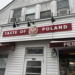 Taste of Poland - Beautiful sign on a cute building