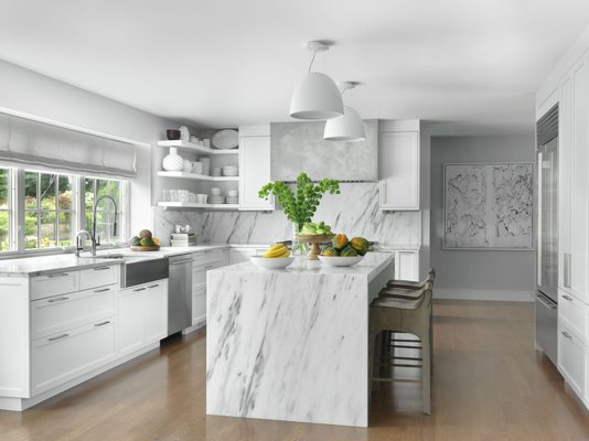 5,000 SF Remodel with Addition - Our team achieved the successful completion of a remarkable 5,000 square foot remodel for an existing house. This transformative project included the addition of a striking second story dedicated to the primary bedroom suite, a stunning gourmet kitchen, and the complete transformation of two bathrooms. Teaming up with the talented Jacob Laws for the interior design, we conceptualized and executed a contemporary and elegant residence. Meticulously crafted design details permeate the space, enhancing both its aesthetic appeal and functional allure.