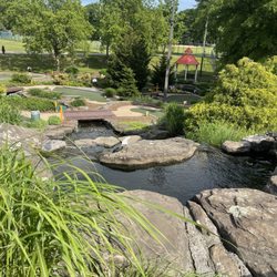 Miniature Golf at Eisenhower Park - It a picture of the water a plants there