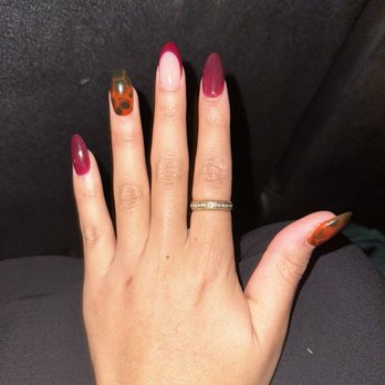 Windermere Nails - Almond shaped acrylics with tortoise shell design and wine colored french tips - Nail Salons Near Me - Cumming, Georgia