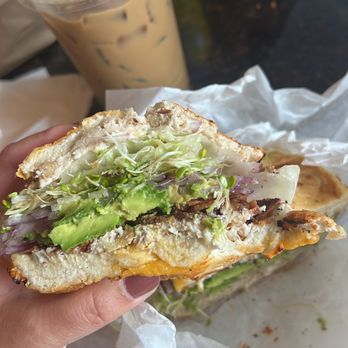 The Bagel Bakery - Build your own sandwich - Cheese bagel w/ date walnut cream cheese, onions, crispy bacon, sprouts, lettuce, and avocado - Coffee & Tea Near Me - Monterey, California The Bagel Bakery - Build your own sandwich - Cheese bagel w/ date walnut cream cheese, onions, crispy bacon, sprouts, lettuce, and avocado - Coffee & Tea Near Me - Monterey, California