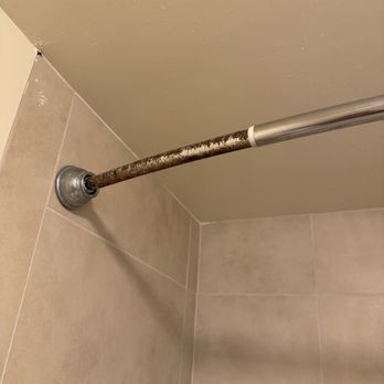 Hilo Hawaiian Hotel - Rusty shower curtain bar - Hotels Near Me - Hilo, Hawaii