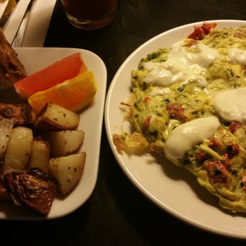 Americana - The special. Egg fritta with pesto, mozzarella, and sundried tomatoes. - New American Near Me - Seattle, Washington Americana - The special. Egg fritta with pesto, mozzarella, and sundried tomatoes. - New American Near Me - Seattle, Washington