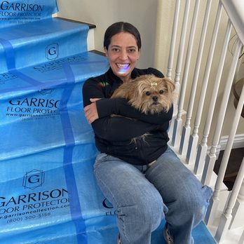Uppacott Legacy Design Build Manage - Samantha carrying Gracie around like a puppy-björn! The light reflecting from a chandelier is a bonus! - General Contractors Near Me Uppacott Legacy Design Build Manage - Samantha carrying Gracie around like a puppy-björn! The light reflecting from a chandelier is a bonus! - General Contractors Near Me