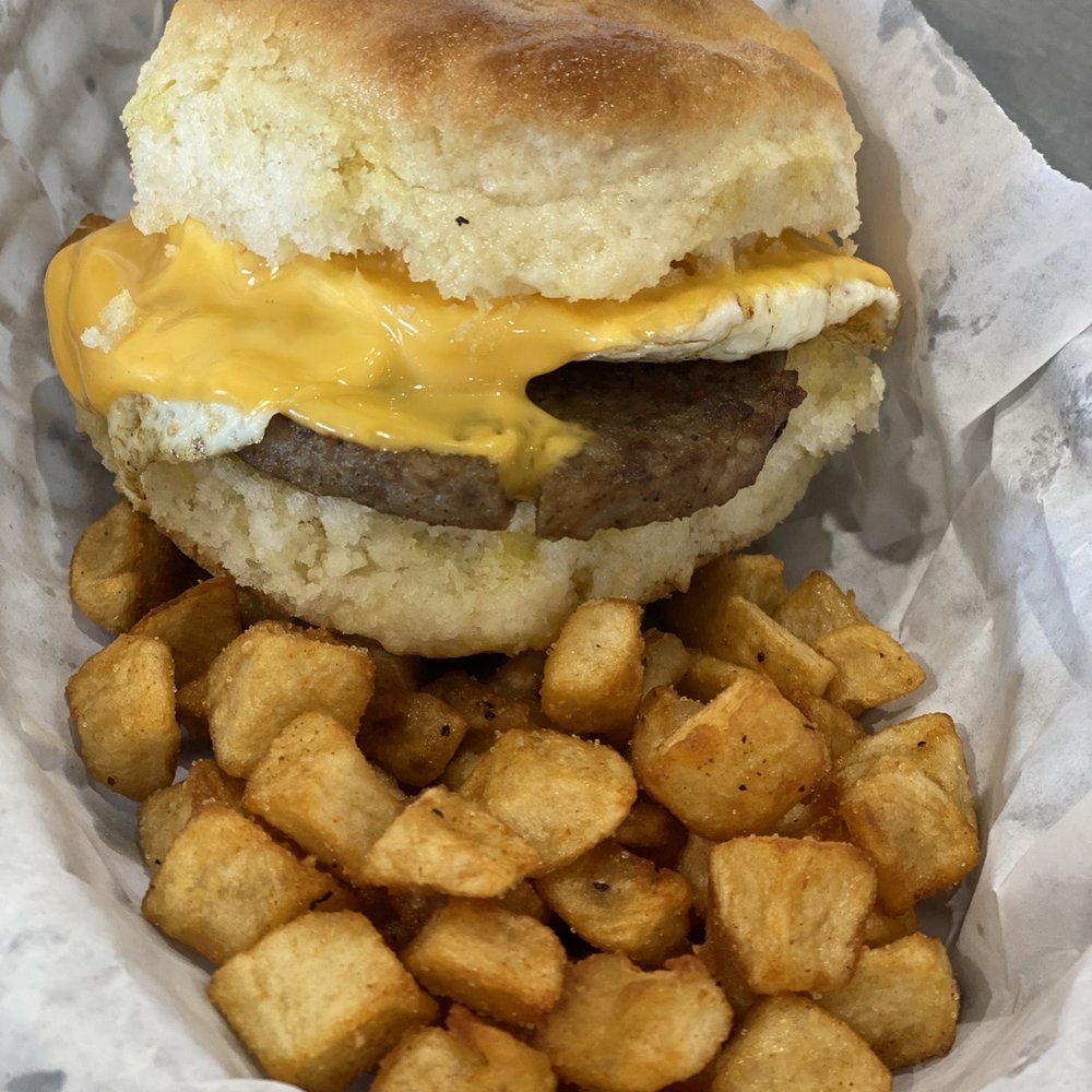 Millstone Biscuit - Sausage, egg and cheese biscuit with home fries - Breakfast & Brunch Near Me - Murrells Inlet, South Carolina