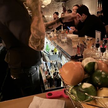 Dear Irving Gramercy - a woman standing at a bar - Venues & Event Spaces Near Me - New York, New York