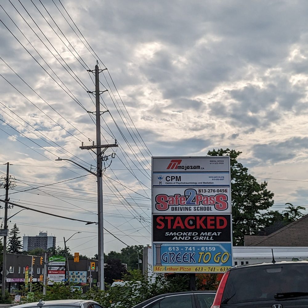 Greek To Go - Sign and cramped parking lot - Greek Near Me - Ottawa, Ontario Greek To Go - Sign and cramped parking lot - Greek Near Me - Ottawa, Ontario