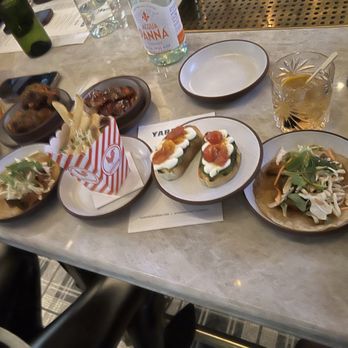 Yardbird Table & Bar - The truffle fries!! Tacos, skewers and crostini yum yum yum - New American Near Me - Chicago, Illinois