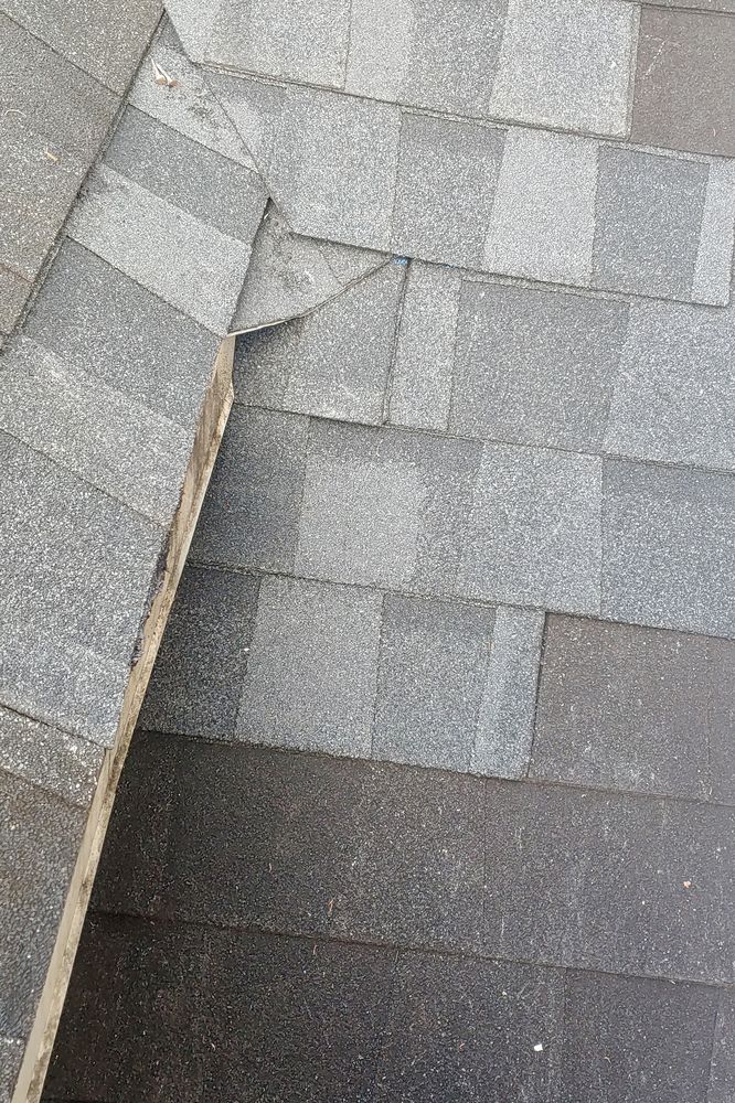 Slide of Northmen Roofing