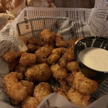 Northwoods Pub - a basket of fried tater tots with dipping sauce - Pubs Near Me - Nisswa, Minnesota Northwoods Pub - a basket of fried tater tots with dipping sauce - Pubs Near Me - Nisswa, Minnesota