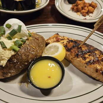 Willie Sue's - Salmon with loaded baked potato. Cooked perfect! - Bars Near Me - Sumter, South Carolina