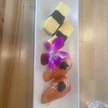 Matsutake Sushi & Sake Bar - Tamago and Salmon nigiri - Sushi Bars Near Me - Reston, Virginia Matsutake Sushi & Sake Bar - Tamago and Salmon nigiri - Sushi Bars Near Me - Reston, Virginia