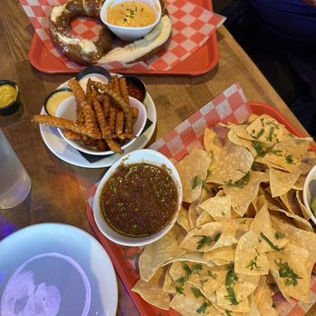 The Porch - Chips with salsa and guac, pretzel with beer cheese, and a side of sweet potato fries!! - Cocktail Bars Near Me - Tempe, Arizona The Porch - Chips with salsa and guac, pretzel with beer cheese, and a side of sweet potato fries!! - Cocktail Bars Near Me - Tempe, Arizona