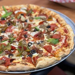 Big Dog’s Deli - Now serving pizza at our new location!!!