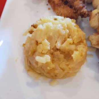 Elvira's Cafe - A small scoop of hashbrown casserole with measly 2 small small waffles with about 6 little tiny fried chicken strips. - American Near Me - Sevierville, Tennessee