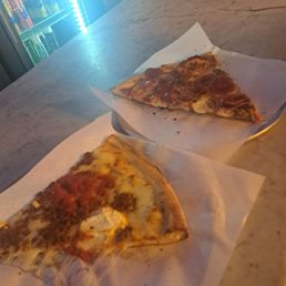 Lasagna, and meat lovers pizza Lasagna, and meat lovers pizza