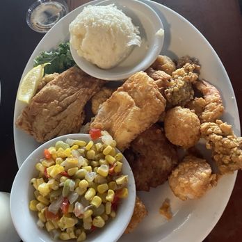The Back Porch - Captain platter which included fried scallions, mahi mahi, shrimp, fried oysters. Delicious! - Seafood Near Me - Destin, Florida The Back Porch - Captain platter which included fried scallions, mahi mahi, shrimp, fried oysters. Delicious! - Seafood Near Me - Destin, Florida