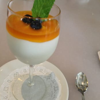 Cafe Julia - The Japanese style cheesecake with Lilikoi. The was my eh.. Very tart, felt like a tart jelly on top of whipped cream/cool whip. - Cafes Near Me - Honolulu, Hawaii