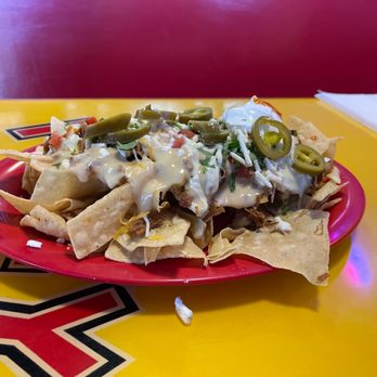 Fuzzy's Taco Shop - a plate of nachos - Mexican Near Me - Denton, Texas Fuzzy's Taco Shop - a plate of nachos - Mexican Near Me - Denton, Texas