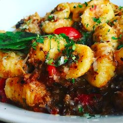The Tomato Shack salad & pizza co, Manayunk - Ricotta Gnocchi with sausage ragu and fire roasted tomato sauce.