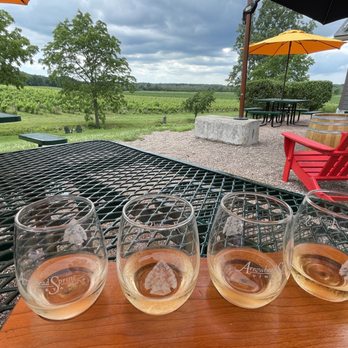 Arrowhead Spring Vineyards - Flight on whites enjoyed on back deck, overlooking vineyards - Wineries Near Me - Lockport, New York