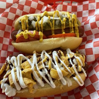 Wacked Out Weiner - Chicago dog up top and a Frito Pie dog.  Both were delicious. - Hot Dogs Near Me - Spring, Texas